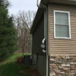 radon mitigation system on exterior
